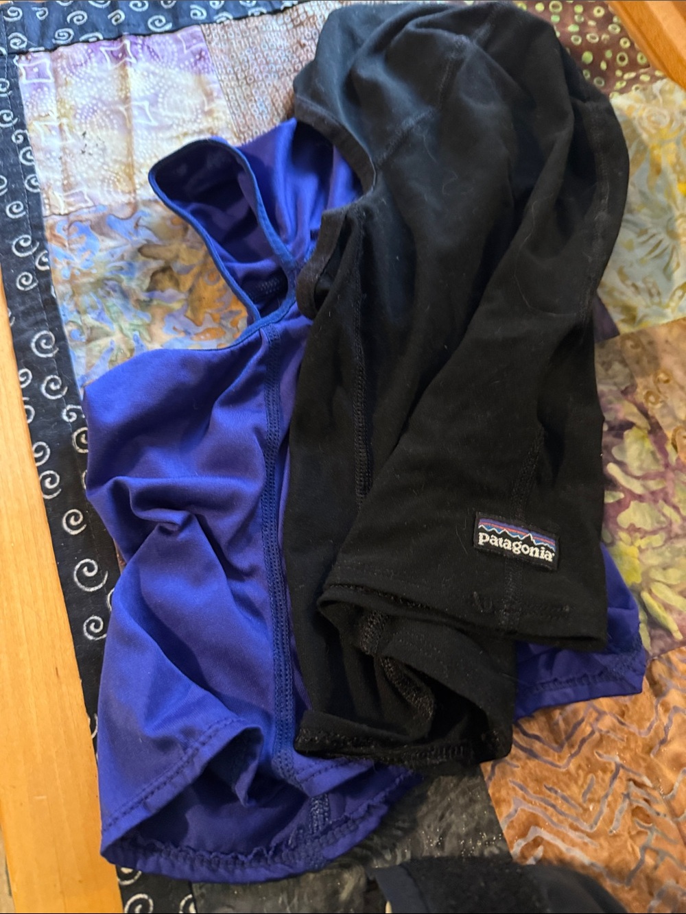 2 Patagonia baclava hoodies in lightweight Capilene, blue and black